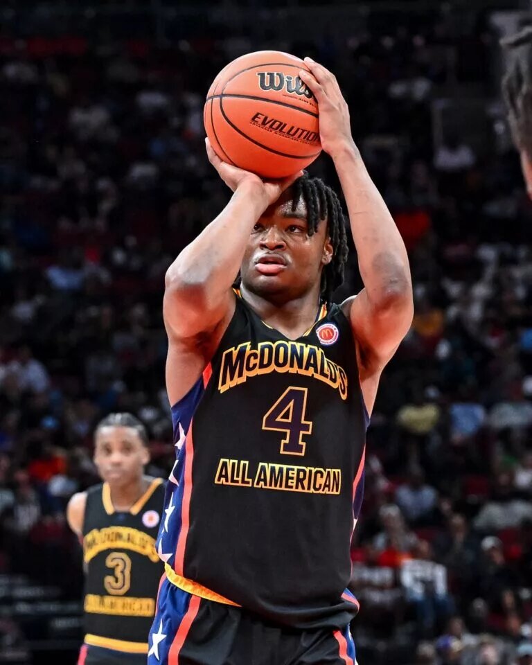 Mar 28, 2023; Houston, TX, USA; McDonald's All American West guard Isaiah Collier (4) shoots a free throw during the first half against the McDonald's All American East at Toyota Center. Mandatory Credit: Maria Lysaker-USA TODAY Sports