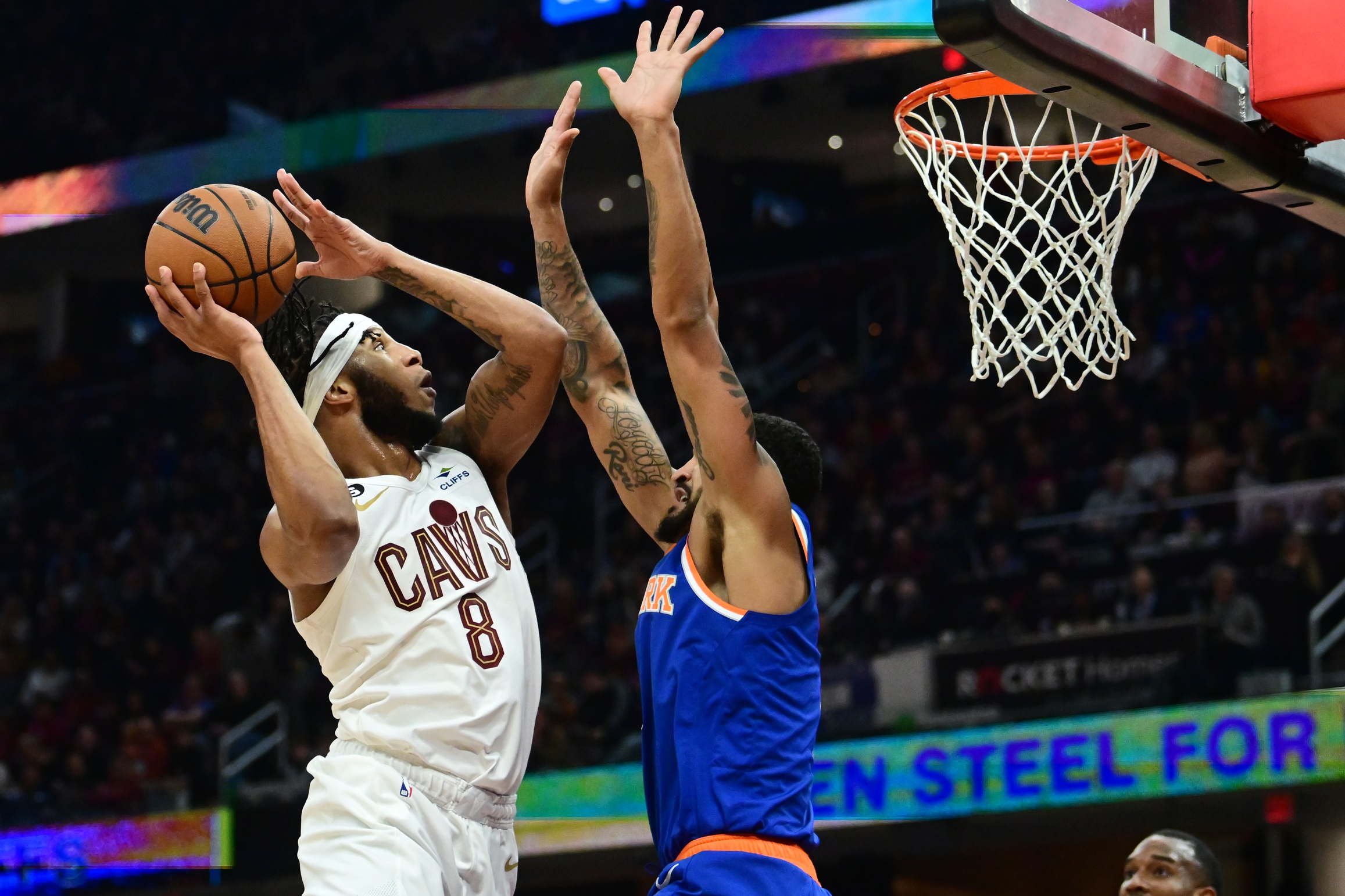 Mar 31, 2023; Cleveland, Ohio, USA; Cleveland Cavaliers forward Lamar Stevens (8) drives to the basket against New York Knicks forward Obi Toppin (1) during the second half at Rocket Mortgage FieldHouse. Mandatory Credit: Ken Blaze-USA TODAY Sports