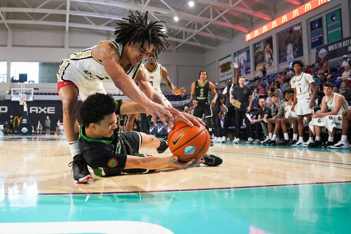 UNC Basketball and former Link Academy Lions guard Elliot Cadeau (3) reaches for the ball during the second quarter of the GEICO High School National championship against the AZ Compass Dragons at Suncoast Credit Union Arena in Fort myers on Saturday, April 1, 2023. Ndn Jh 20230401 Geiconaitonalsboys 0004