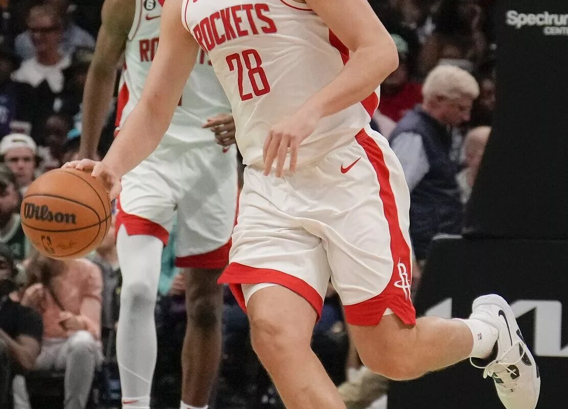 Apr 7, 2023; Charlotte, North Carolina, USA; Houston Rockets center Alperen Sengun (28) brings the ball up court against the Charlotte Hornets during the second quarter at the Spectrum Center. Mandatory Credit: Jim Dedmon-USA TODAY Sports
