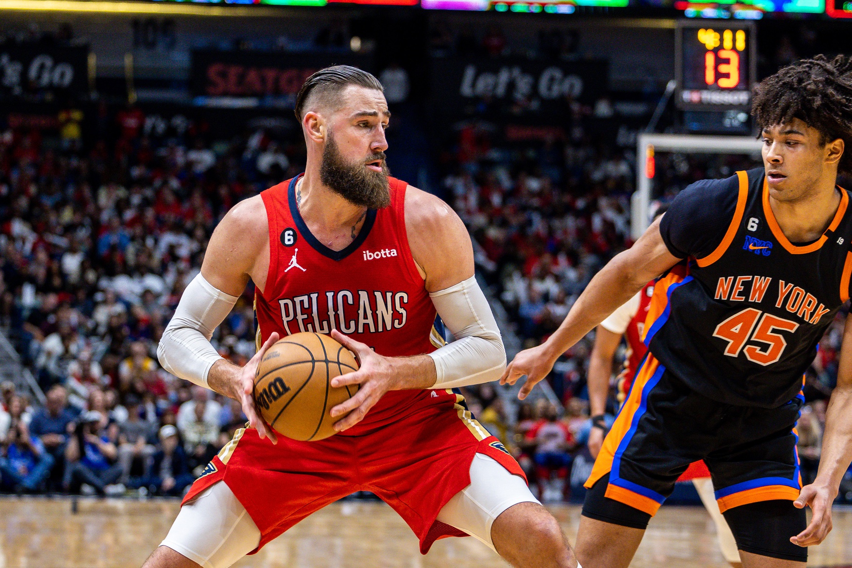 Apr 7, 2023; New Orleans, Louisiana, USA; New Orleans Pelicans center Jonas Valanciunas (17) controls the ball against New York Knicks center Jericho Sims (45) during the second half at Smoothie King Center. Mandatory Credit: Stephen Lew-USA TODAY Sports