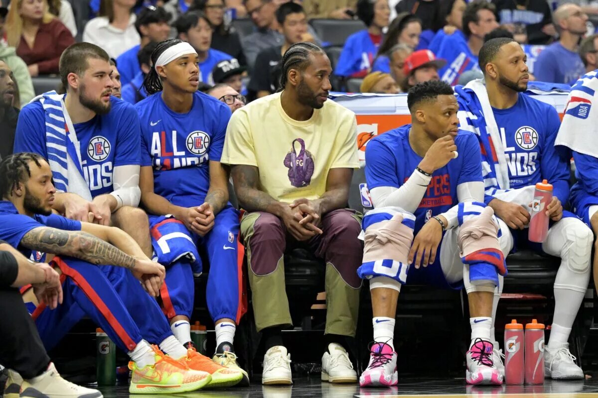 Apr 20, 2023; Los Angeles, California, USA; Los Angeles Clippers forward Kawhi Leonard (2) looks on from the bench in the first half against the Phoenix Suns at Crypto.com Arena. Mandatory Credit: Jayne Kamin-Oncea-USA TODAY Sports