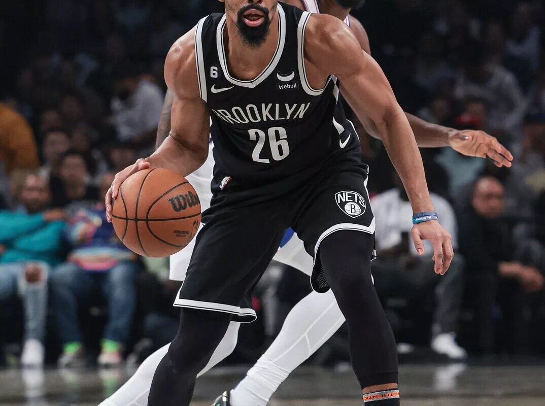 Apr 22, 2023; Brooklyn, New York, USA; Nets guard Spencer Dinwiddie (26) dribbles in front of Philadelphia 76ers guard Shake Milton (18) during the second quarter of game four of the 2023 NBA playoffs at Barclays Center. Mandatory Credit: Vincent Carchietta-USA TODAY Sports