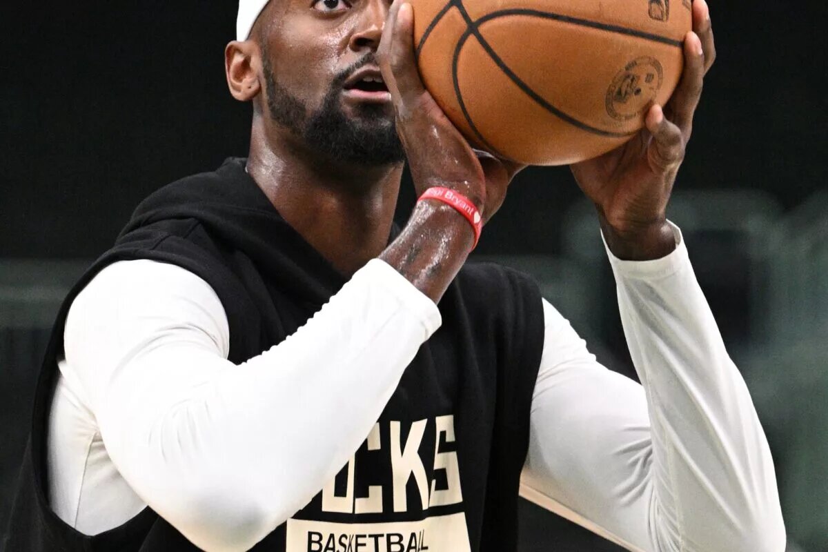 USA Basketball. Apr 26, 2023; Milwaukee, Wisconsin, USA; Milwaukee Bucks forward Bobby Portis (9) shoots freethows during warmups before game five against the Miami Heat of the 2023 NBA Playoffs at Fiserv Forum. Mandatory Credit: Michael McLoone-USA TODAY Sports