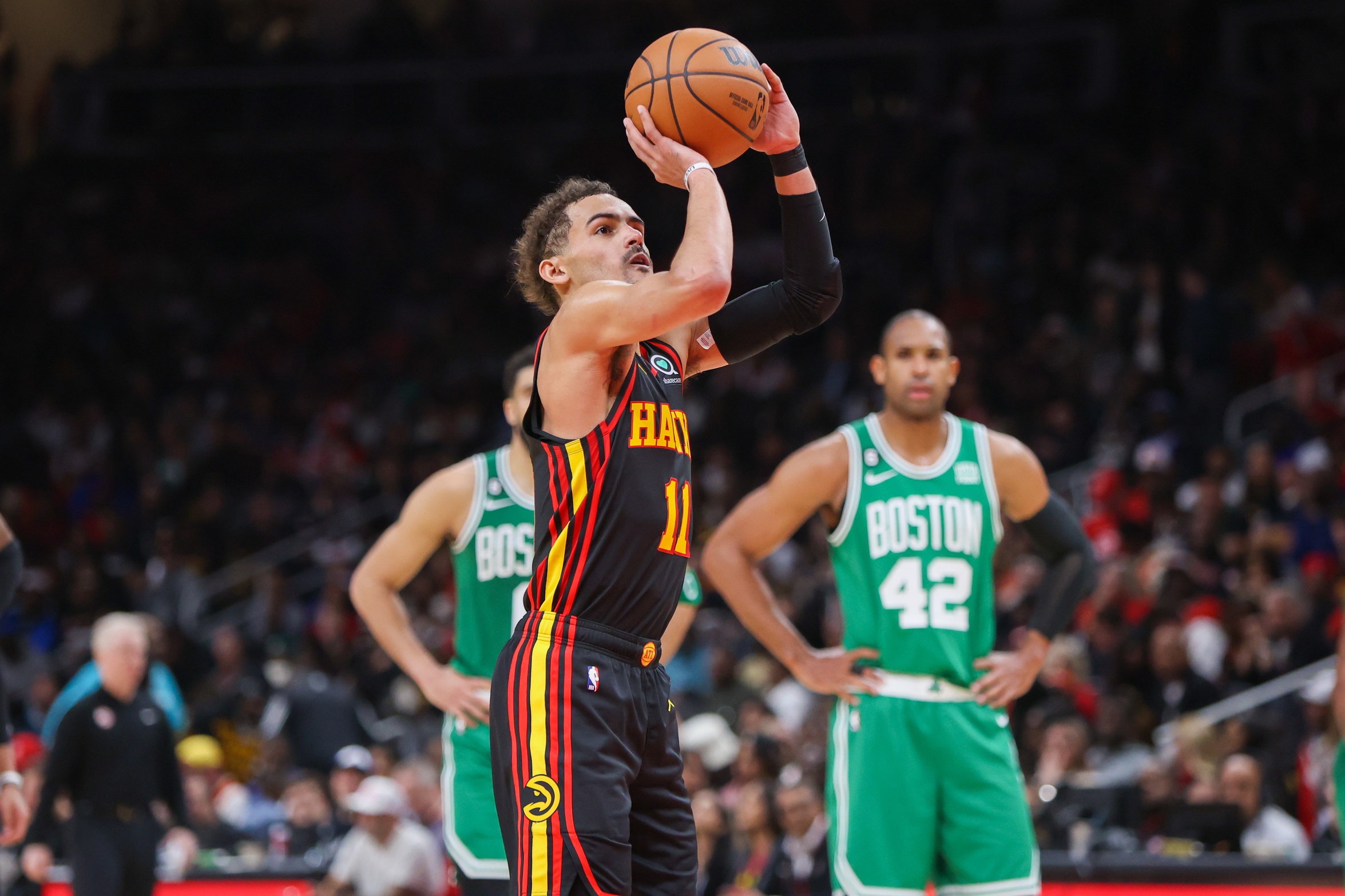 Apr 27, 2023; Atlanta, Georgia, USA; Atlanta Hawks guard Trae Young (11) shoots a free throw against the Boston Celtics in the second half during game six of the 2023 NBA playoffs at State Farm Arena. Mandatory Credit: Brett Davis-USA TODAY Sports