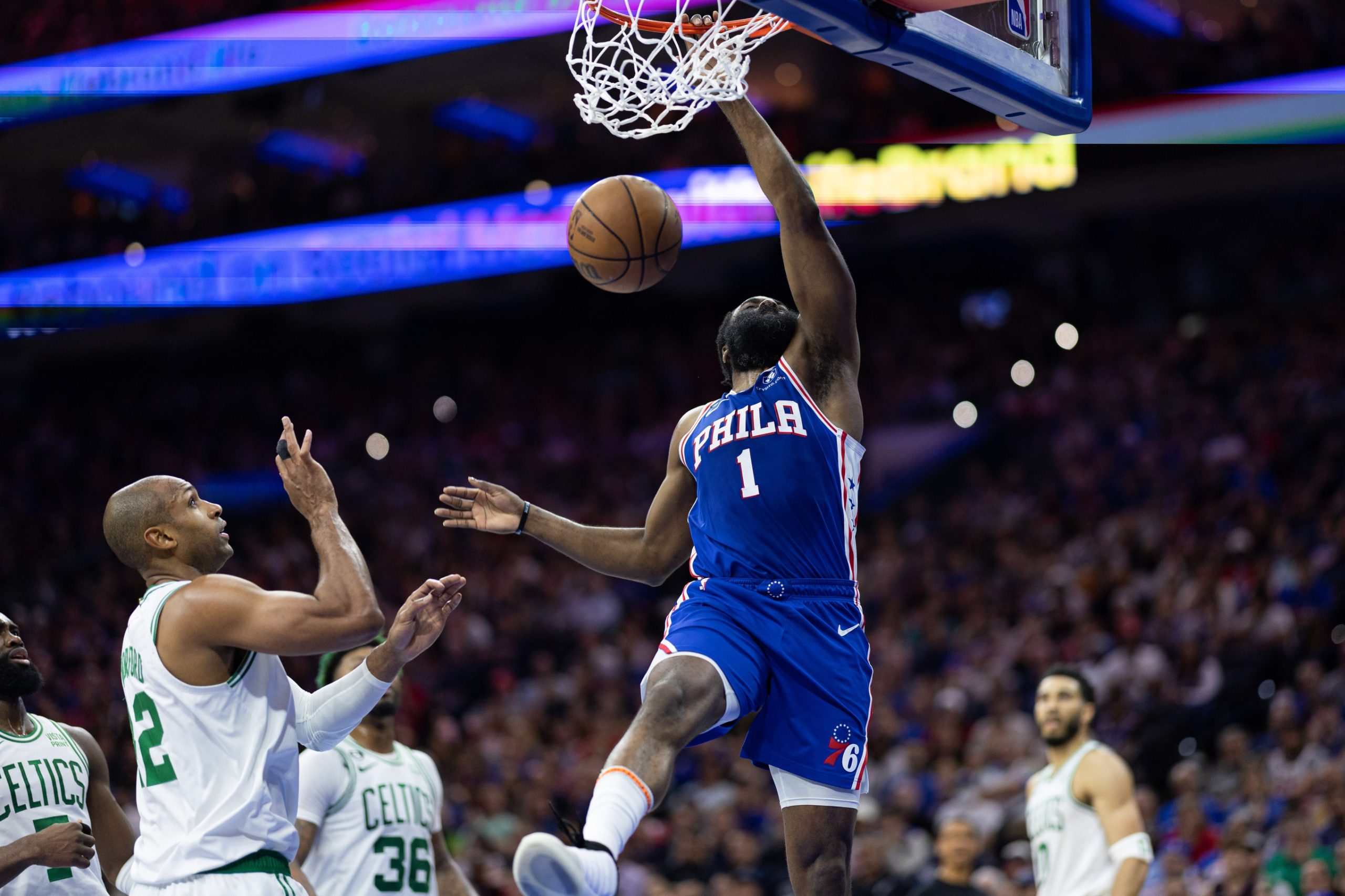 May 11, 2023; Philadelphia, Pennsylvania, USA; Philadelphia 76ers guard James Harden (1) dunks the ball against Boston Celtics center Al Horford (42) during the second quarter in game six of the 2023 NBA playoffs at Wells Fargo Center. Mandatory Credit: Bill Streicher-USA TODAY Sports
