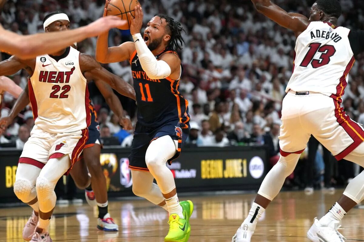 May 12, 2023; Miami, Florida, USA; New York Knicks guard Jalen Brunson (11) drives to the basket as Miami Heat forward Jimmy Butler (22) defends in the first half during game six of the 2023 NBA playoffs at Kaseya Center. Mandatory Credit: Jim Rassol-USA TODAY Sports