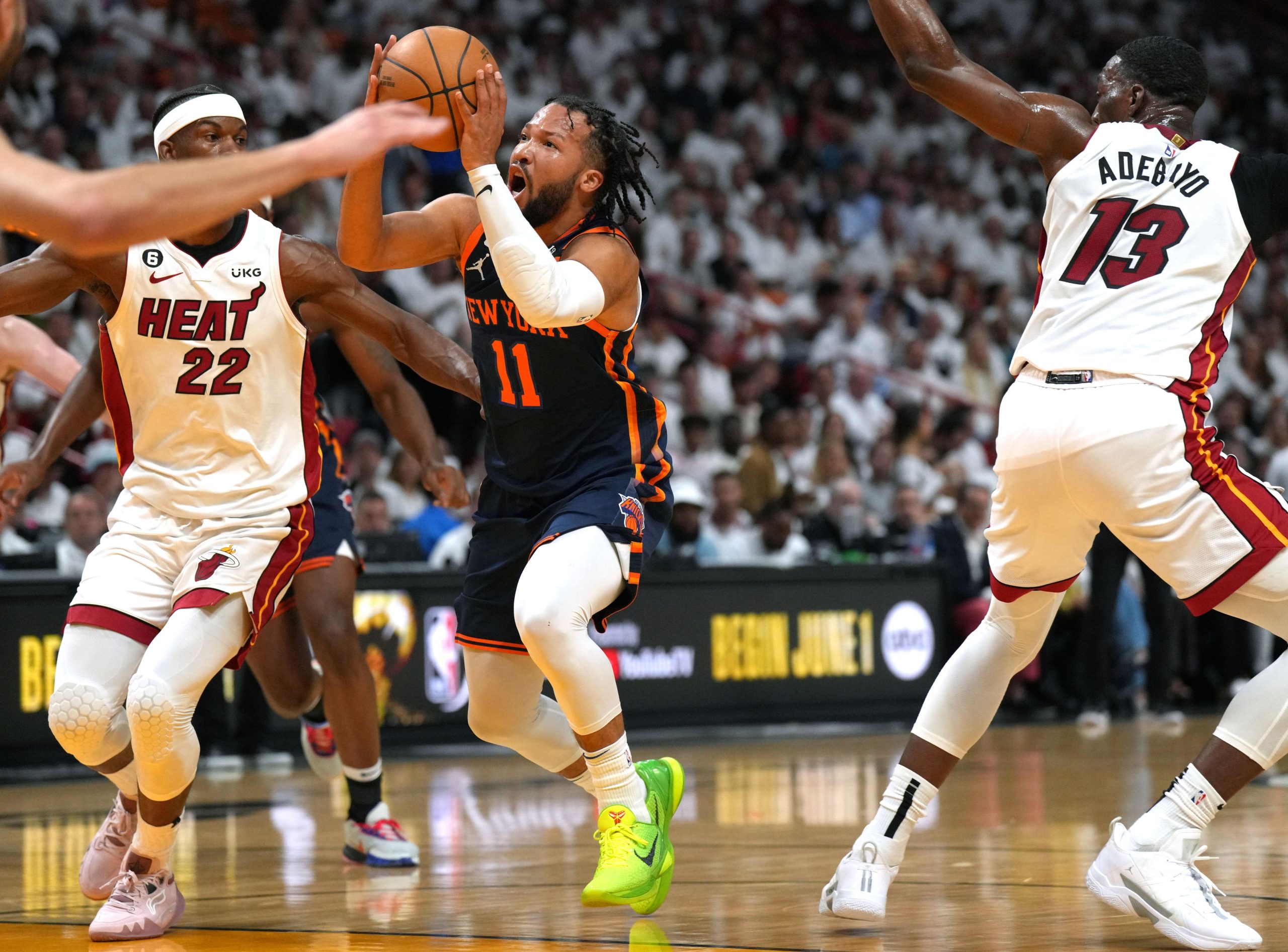 May 12, 2023; Miami, Florida, USA; New York Knicks guard Jalen Brunson (11) drives to the basket as Miami Heat forward Jimmy Butler (22) defends in the first half during game six of the 2023 NBA playoffs at Kaseya Center. Mandatory Credit: Jim Rassol-USA TODAY Sports
