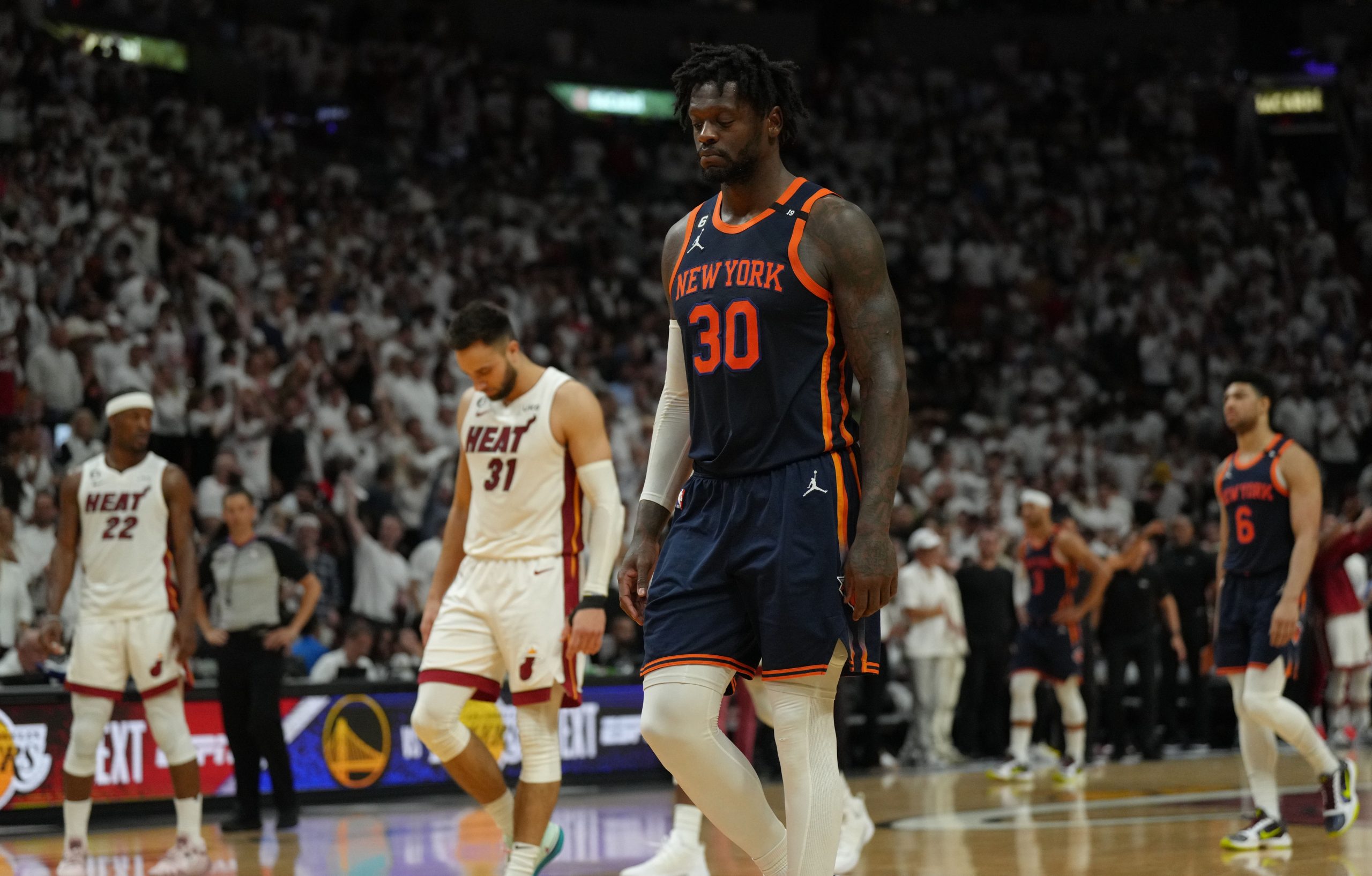 May 12, 2023; Miami, Florida, USA; New York Knicks forward Julius Randle (30) walks up the court as the Miami Heat heat to the free throw line late in the fourth quarter during game six of the 2023 NBA playoffs at Kaseya Center. Mandatory Credit: Jim Rassol-USA TODAY Sports