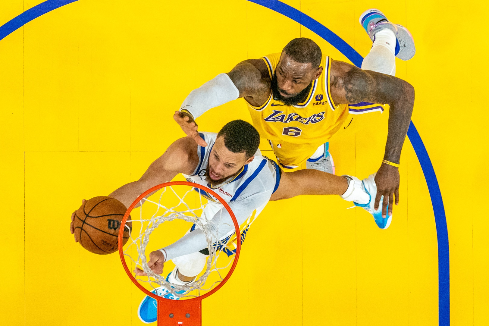 May 10, 2023; San Francisco, California, USA; Golden State Warriors guard Stephen Curry (30) shoots the basketball against Los Angeles Lakers forward LeBron James (6) during the second half in game five of the 2023 NBA playoffs conference semifinals round at Chase Center. Mandatory Credit: Kyle Terada-USA TODAY Sports. This could be a potential NBA Christmas match-up