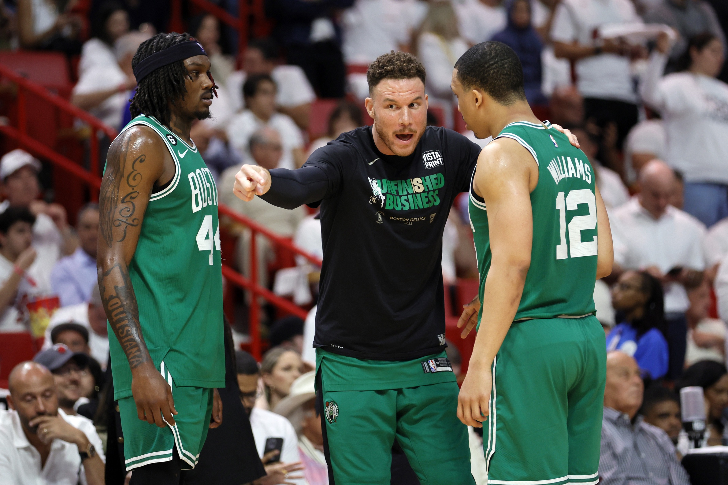 May 23, 2023; Miami, Florida, USA; Boston Celtics forward Blake Griffin (91) talks with center Robert Williams III (44) and forward Grant Williams (12) in the fourth quarter during game four of the Eastern Conference Finals for the 2023 NBA playoffs at Kaseya Center. Mandatory Credit: Sam Navarro-USA TODAY Sports