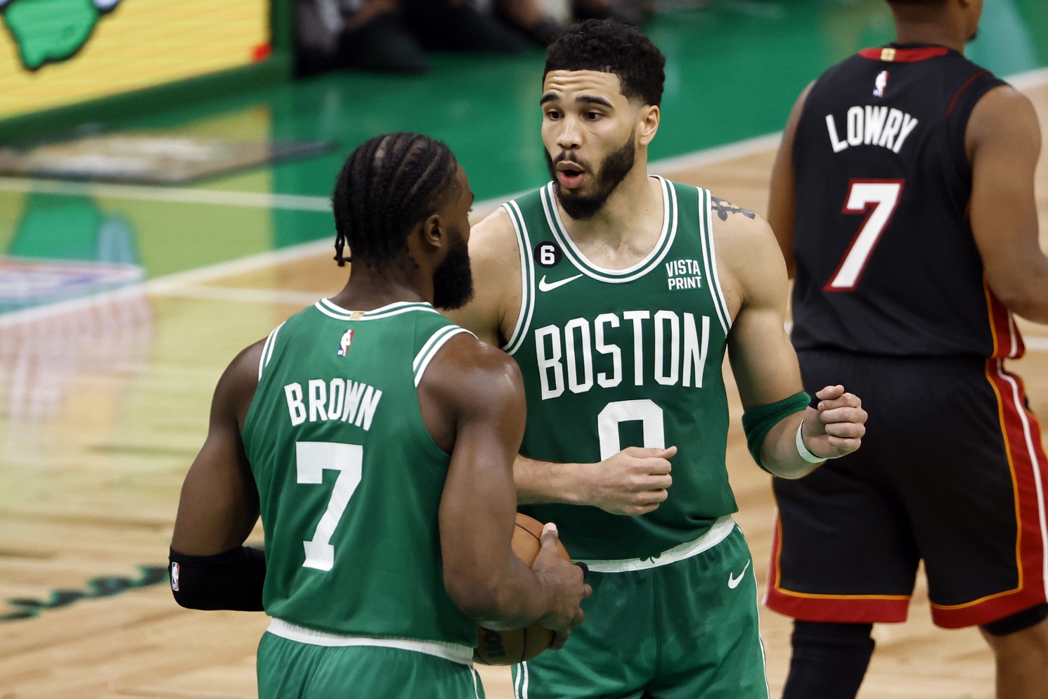 May 29, 2023; Boston, Massachusetts, USA; Boston Celtics forward Jayson Tatum (0) and guard Jaylen Brown (7) talk during the third quarter against the Miami Heat in game seven of the Eastern Conference Finals for the 2023 NBA playoffs at TD Garden. Mandatory Credit: Winslow Townson-USA TODAY Sports