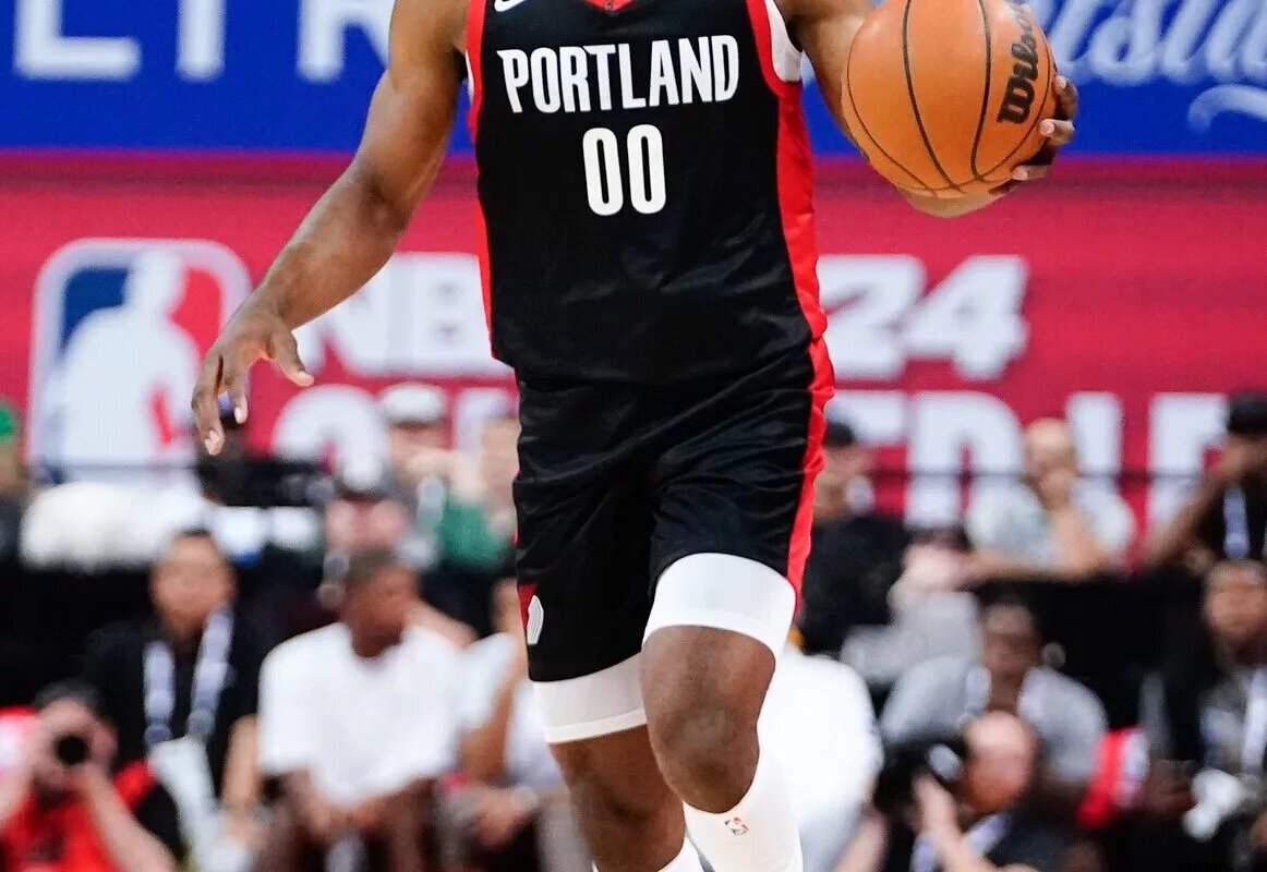 NBA: Jul 7, 2023; Las Vegas, NV, USA; Portland Trail Blazers guard Scoot Henderson (00) dribbles the ball against the Houston Rockets during the first half at Thomas & Mack Center. Mandatory Credit: Lucas Peltier-USA TODAY Sports