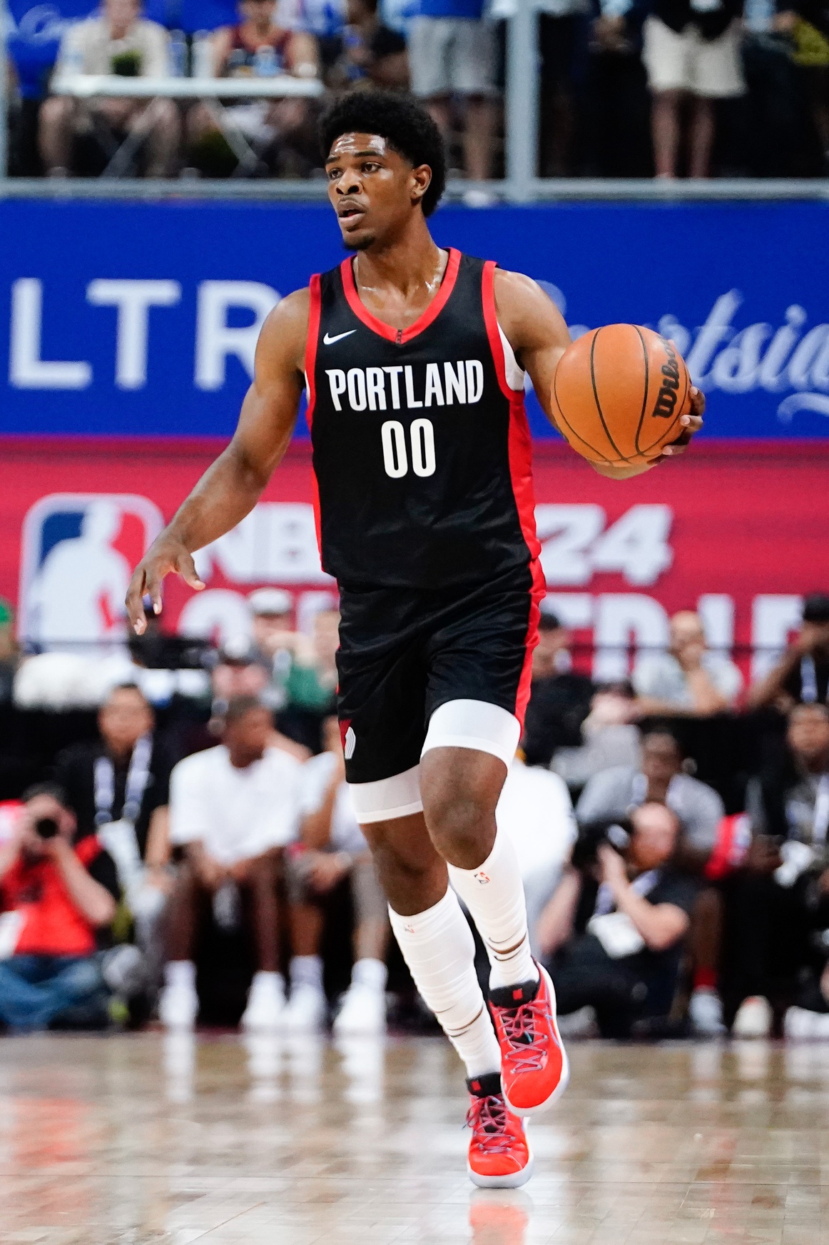 NBA: Jul 7, 2023; Las Vegas, NV, USA; Portland Trail Blazers guard Scoot Henderson (00) dribbles the ball against the Houston Rockets during the first half at Thomas & Mack Center. Mandatory Credit: Lucas Peltier-USA TODAY Sports
