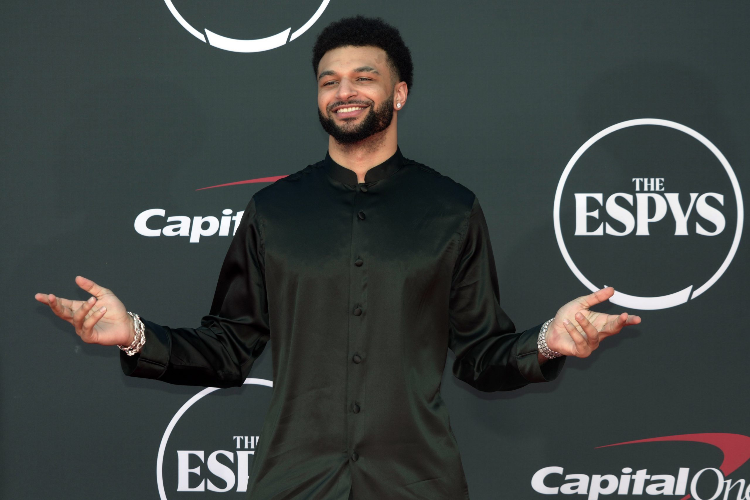 Jul 12, 2023; Los Angeles, CA, USA; Denver Nuggets point guard Jamal Murray arrives on the red carpet before the 2023 ESPYS at the Dolby Theatre. Mandatory Credit: Kirby Lee-USA TODAY Sports. Murray is a player to consider in this fantasy basketball match-up between Canada and the US.