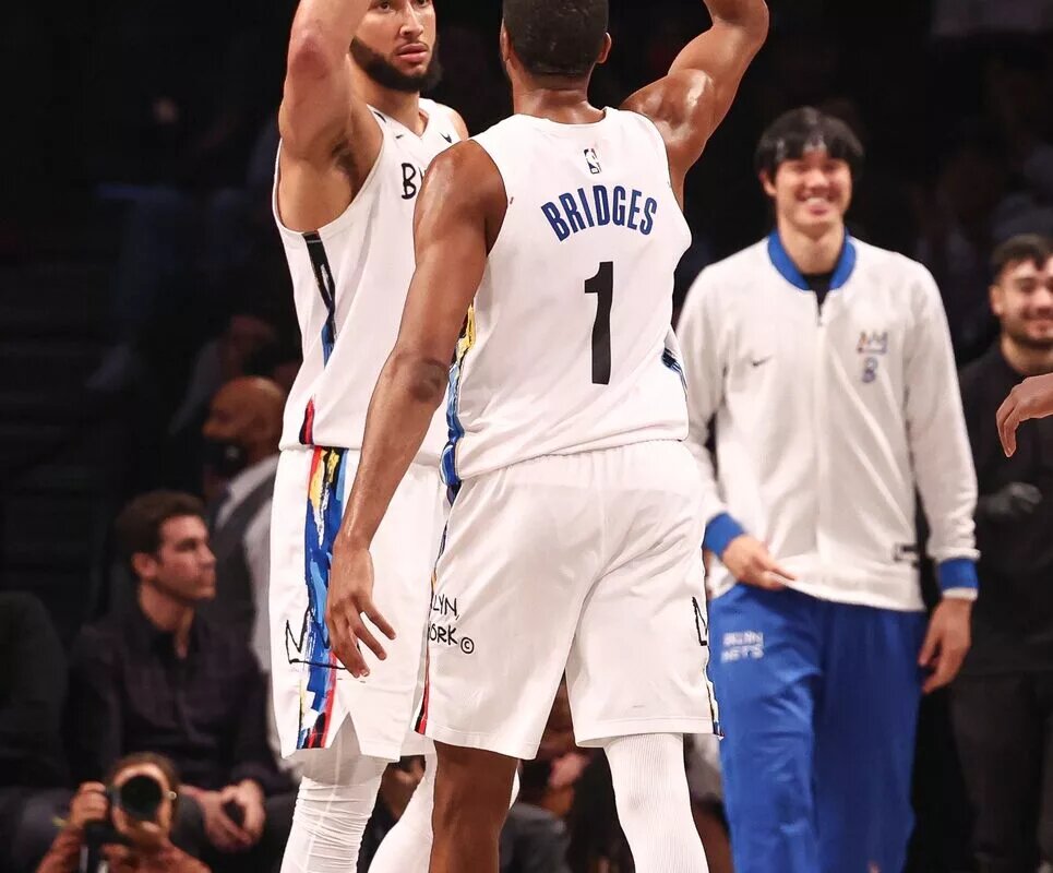 Feb 15, 2023; Brooklyn, New York, USA; Brooklyn Nets guard Ben Simmons (10) high fives forward Mikal Bridges (1) during the second half against the Miami Heat at Barclays Center. Mandatory Credit: Vincent Carchietta-USA TODAY Sports