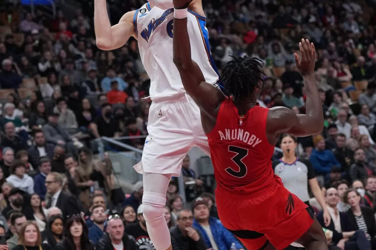 Mar 26, 2023; Toronto, Ontario, CAN; Washington Wizards center Kristaps Porzingis (6) drives to the basket as Toronto Raptors forward O.G. Anunoby (3) tries to defend during the fourth quarter at Scotiabank Arena. Mandatory Credit: Nick Turchiaro-USA TODAY Sports. He is one player expected for Celtics Training Camp