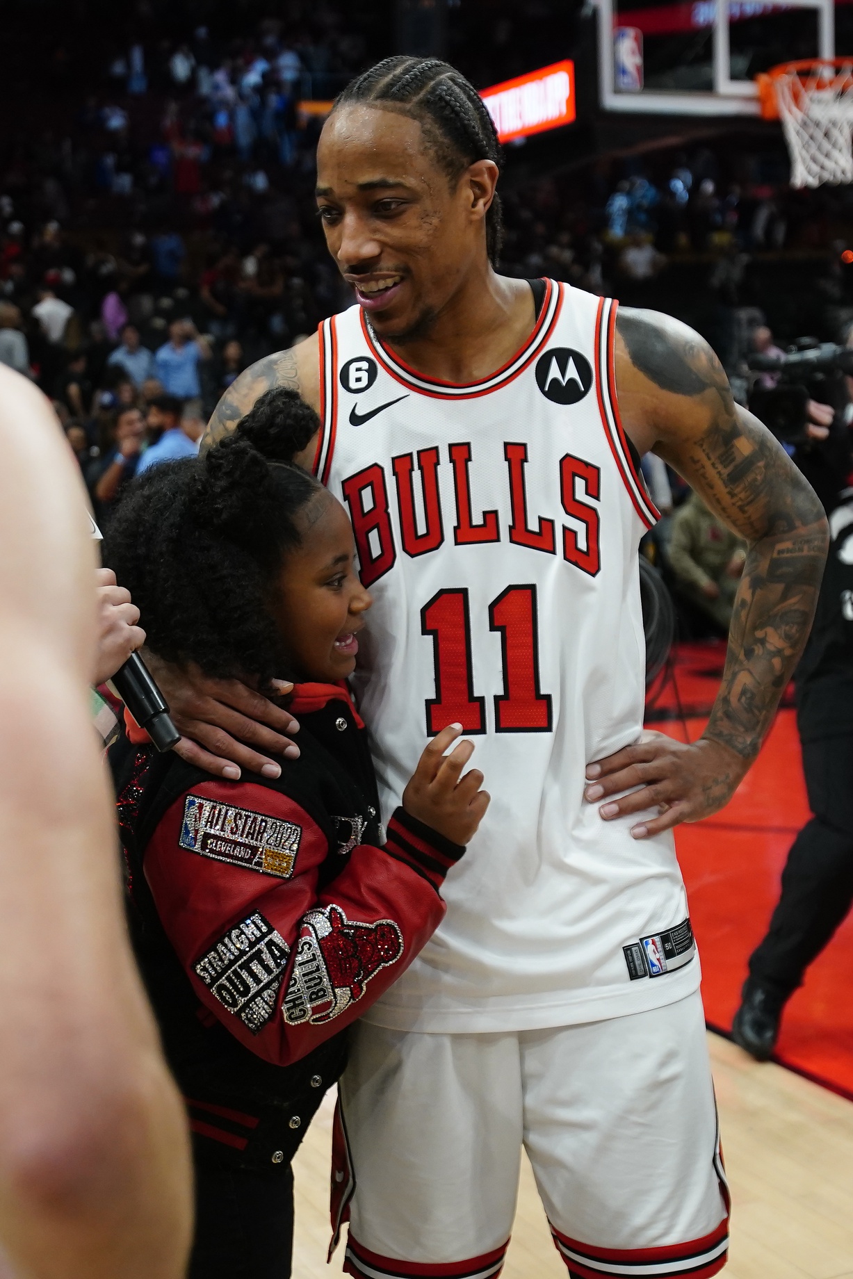 Demar DeRozan's legacy: Apr 12, 2023; Toronto, Ontario, CAN; Chicago Bulls forward DeMar DeRozan (11) gets a hug from his daughter after a win over the Toronto Raptors in the NBA Play-In game at Scotiabank Arena. Mandatory Credit: John E. Sokolowski-USA TODAY Sports