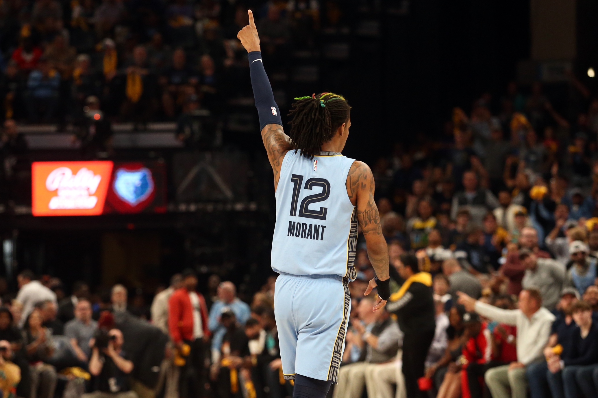 Apr 26, 2023; Memphis, Tennessee, USA; Memphis Grizzlies guard Ja Morant (12) reacts during the first half against the Los Angeles Lakers during game five of the 2023 NBA playoffs at FedExForum. Mandatory Credit: Petre Thomas-USA TODAY Sports