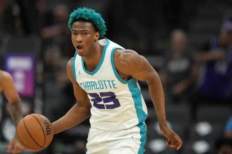 Jul 5, 2023; Sacramento, CA, USA; Charlotte Hornets forward Kai Jones (23) dribbles against the Golden State Warriors during the third quarter at Golden 1 Center. Mandatory Credit: Darren Yamashita-USA TODAY Sports
