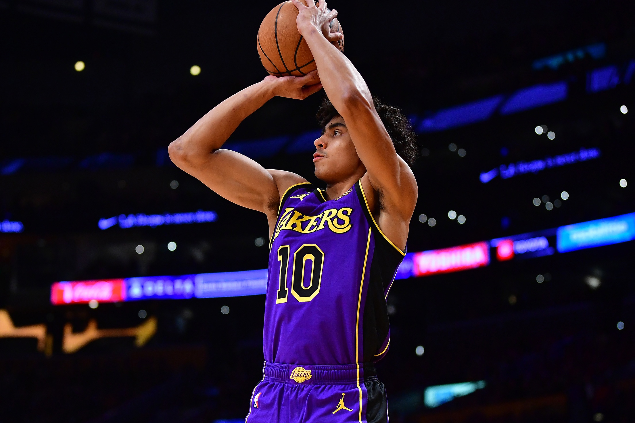 Jan 6, 2023; Los Angeles, California, USA; Los Angeles Lakers guard Max Christie (10) shoots against the Atlanta Hawks during the second half at Crypto.com Arena. Mandatory Credit: Gary A. Vasquez-USA TODAY Sports
