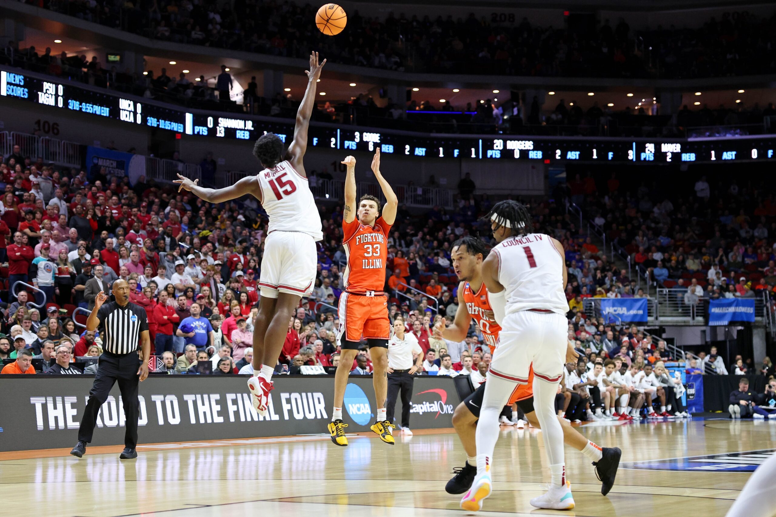 Mar 16, 2023; Des Moines, IA, USA; Illinois Fighting Illini forward Coleman Hawkins (33) shoots the ball against Arkansas Razorbacks forward Makhi Mitchell (15) during the first half at Wells Fargo Arena. Mandatory Credit: Reese Strickland-USA TODAY Sports