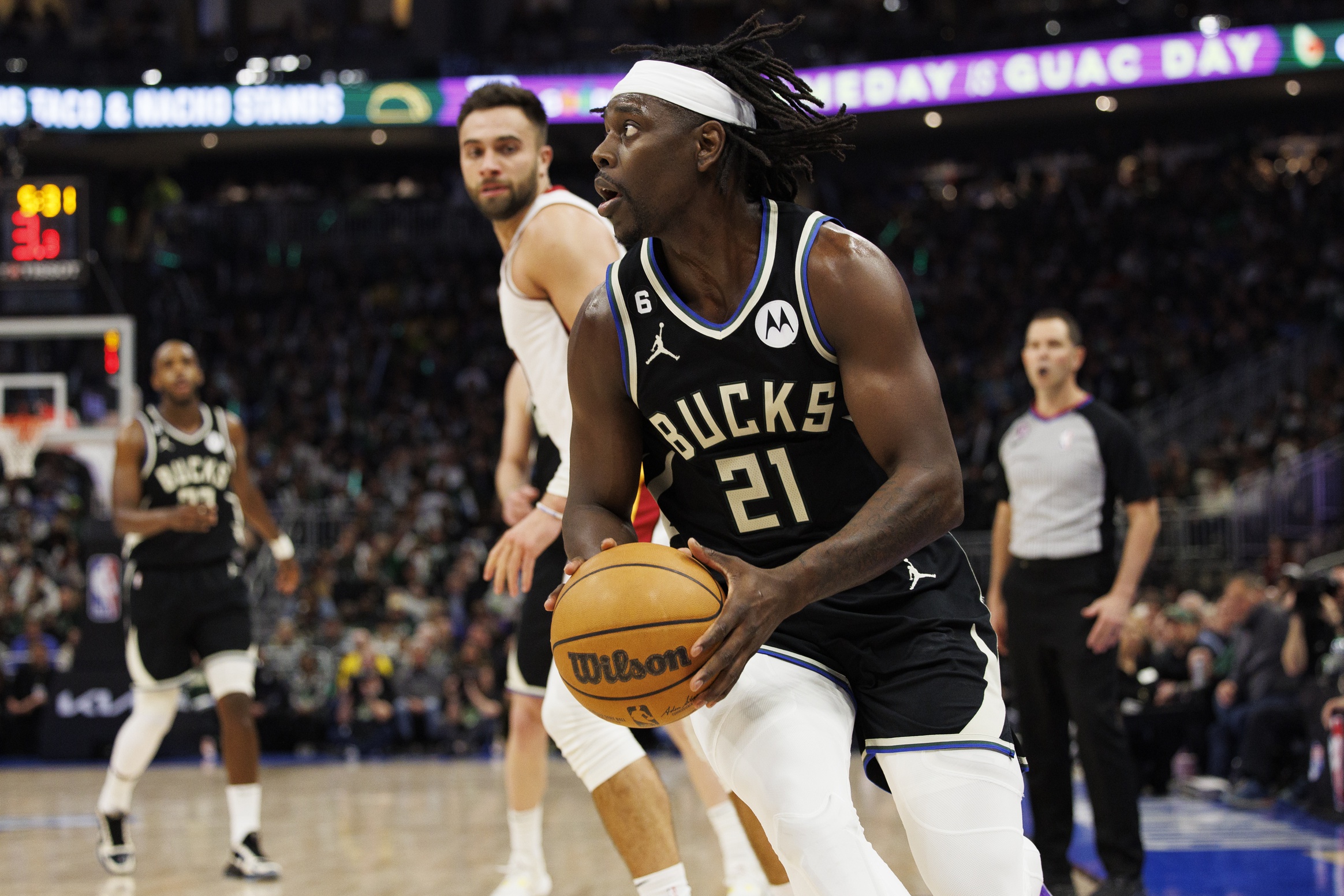 Apr 19, 2023; Milwaukee, Wisconsin, USA; Milwaukee Bucks guard Jrue Holiday (21) looks to shoot during the third quarter against the Miami Heat during game two of the 2023 NBA Playoffs at Fiserv Forum. Mandatory Credit: Jeff Hanisch-USA TODAY Sports