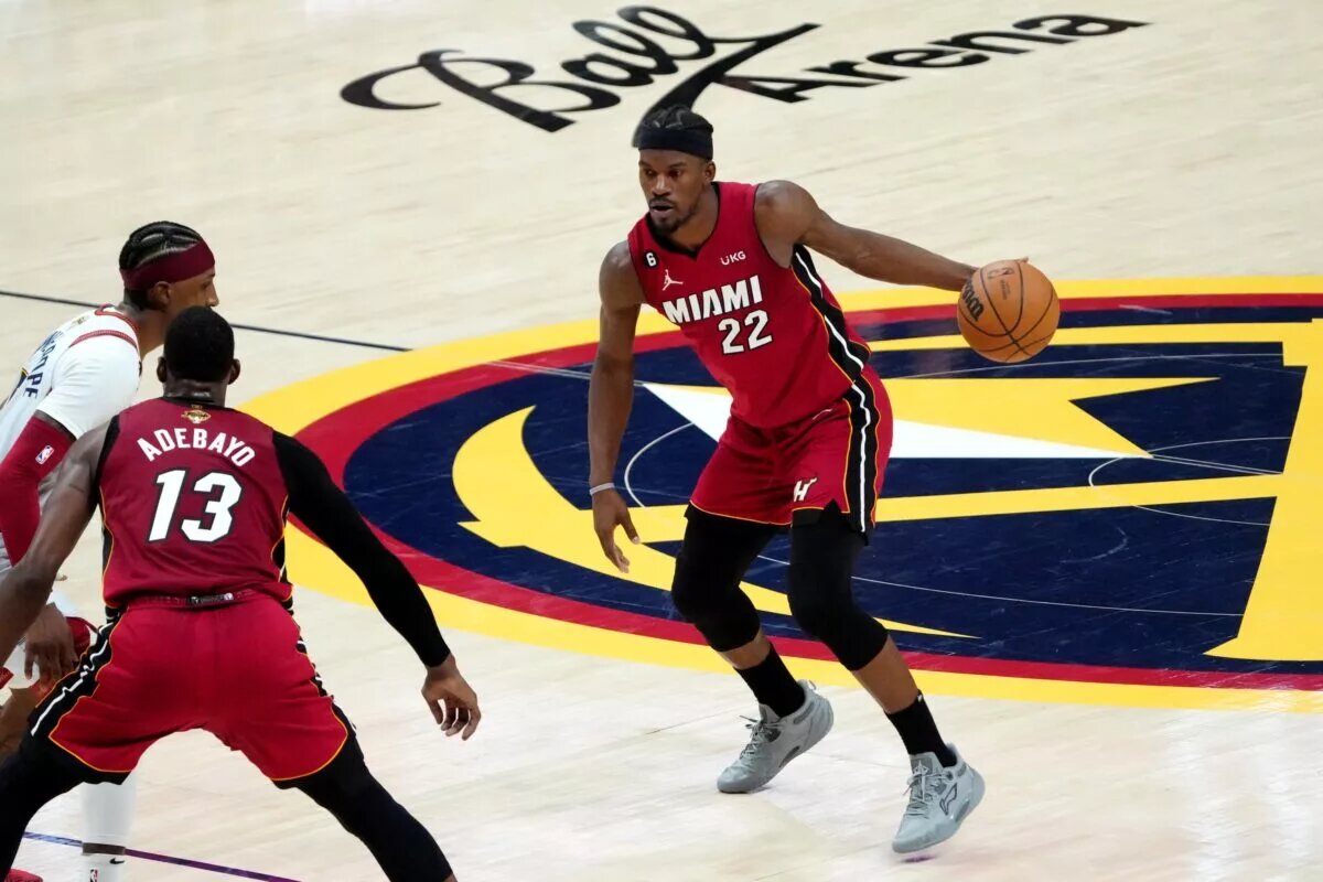 Jun 12, 2023; Denver, Colorado, USA; Miami Heat forward Jimmy Butler (22) dribbles during the fourth quarter of game five of the 2023 NBA Finals against the Denver Nuggets at Ball Arena. Mandatory Credit: Ron Chenoy-USA TODAY Sports