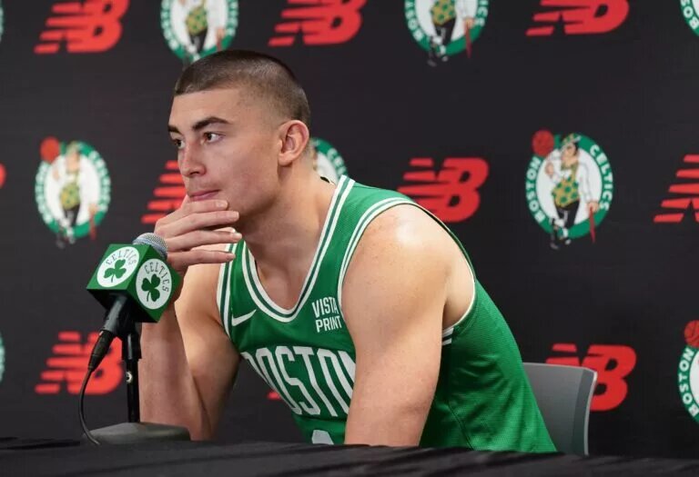 Oct 2, 2023; Boston, Celtics, USA; Boston Celtics guard Payton Pritchard (11) talks with sports media during Boston Celtics Media Day. Mandatory Credit: David Butler II-USA TODAY Sports