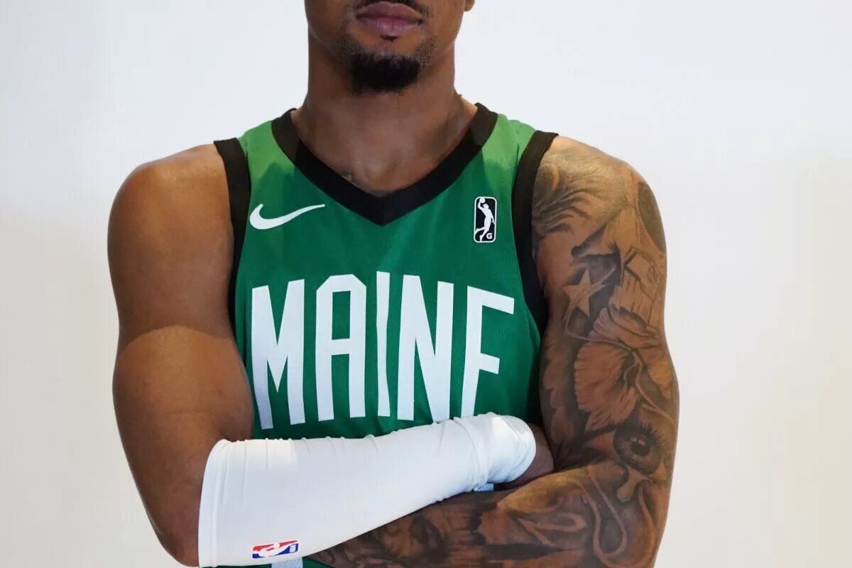 Oct 2, 2023; Boston, Celtics, USA; Boston Celtics guard Jay Scrubb (29) poses for a photo during Boston Celtics Media Day. Mandatory Credit: David Butler II-USA TODAY Sports