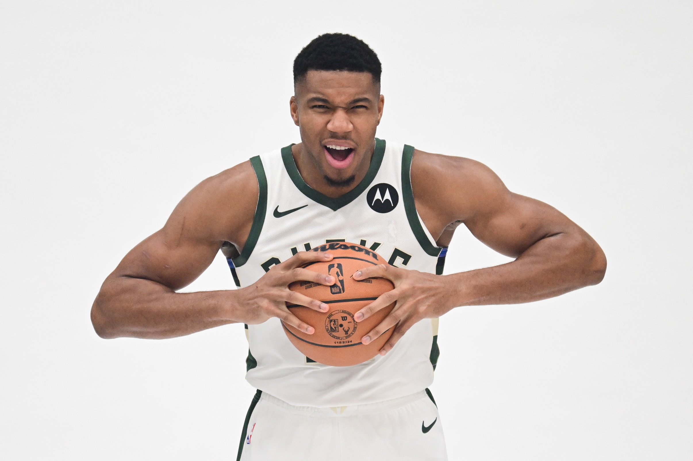 Oct 2, 2023; Milwaukee, WI, USA; Milwaukee Bucks forward Giannis Antetokounmpo (34) poses for a picture during media day in Milwaukee. Mandatory Credit: Benny Sieu-USA TODAY Sports. The Bucks are the favorite in the Central Division as well as one of the favorites in the Eastern Conference