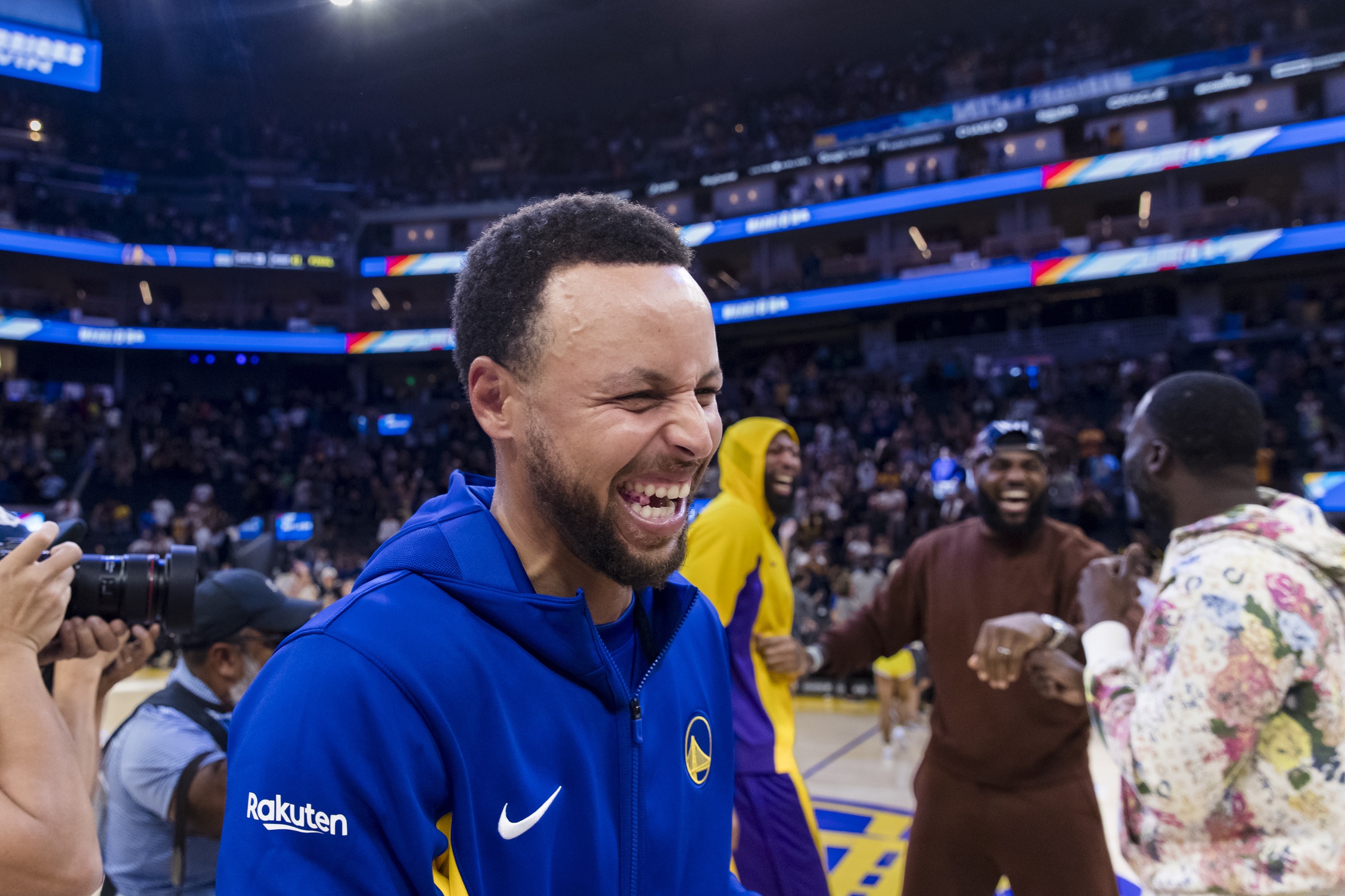 Oct 7, 2023; San Francisco, California, USA; Golden State Warriors guard Stephen Curry (30) laughs as he exits the court after a game against the Los Angeles Lakers at Chase Center. Mandatory Credit: John Hefti-USA TODAY Sports