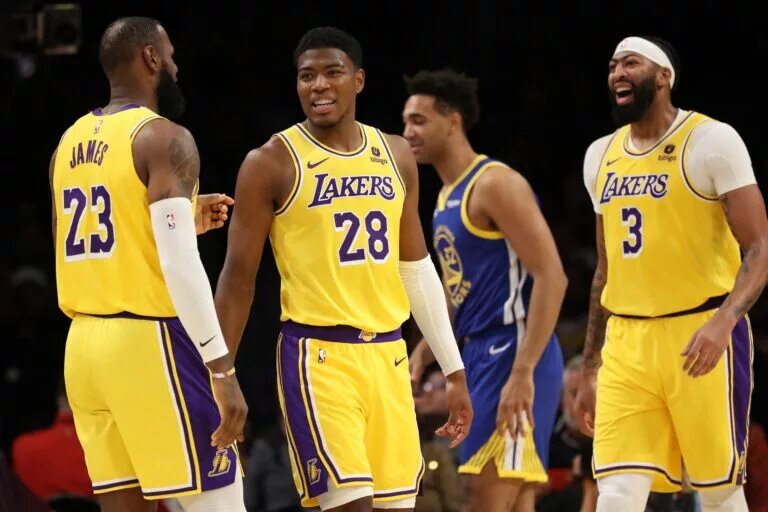 Oct 13, 2023; Los Angeles, California, USA; Los Angeles Lakers forward Rui Hachimura (28) smiles with forward LeBron James (23) and forward Anthony Davis (3) during the first half against the Golden State Warriors at Crypto.com Arena. Mandatory Credit: Kiyoshi Mio-USA TODAY Sports