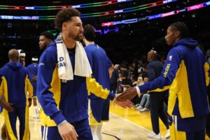 Oct 13, 2023; Los Angeles, California, USA; Golden State Warriors guard Klay Thompson (11) celebrates a victory against the Los Angeles Lakers at Crypto.com Arena. Mandatory Credit: Kiyoshi Mio-USA TODAY Sports