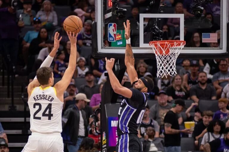 Oct 19, 2023; Sacramento, California, USA; Sacramento Kings center JaVale McGee (00) attempts to block a shot by Utah Jazz center Walker Kessler (24) during the first quarter at Golden 1 Center. Mandatory Credit: Ed Szczepanski-USA TODAY Sports