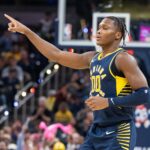 Oct 25, 2023; Indianapolis, Indiana, USA; Indiana Pacers guard Bennedict Mathurin (00) celebrates a made three pointer in the second half against the Washington Wizards at Gainbridge Fieldhouse. Mandatory Credit: Trevor Ruszkowski-USA TODAY Sports