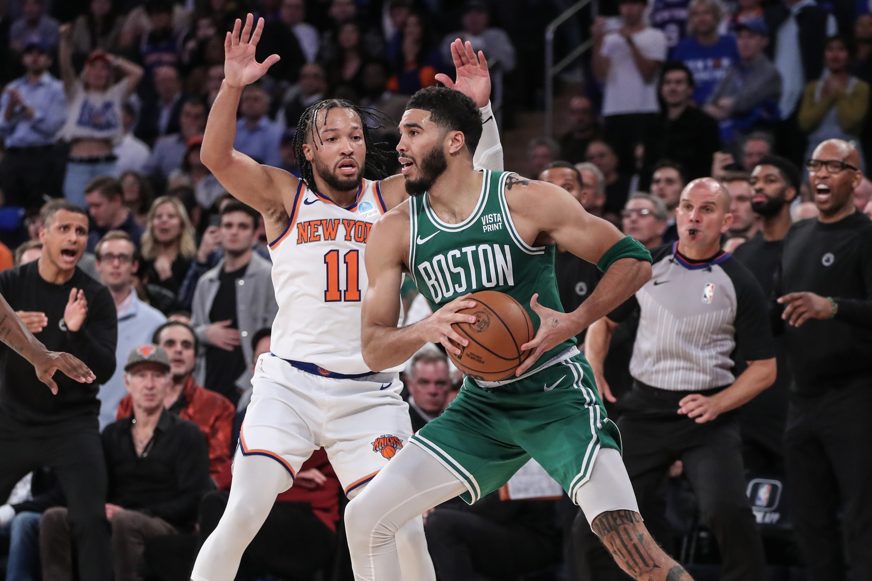 Oct 25, 2023; New York, New York, USA; Boston Celtics forward Jayson Tatum (0) is guarded by New York Knicks guard Jalen Brunson (11) while trying to make a pass in the fourth quarter at Madison Square Garden. Mandatory Credit: Wendell Cruz-USA TODAY Sports
