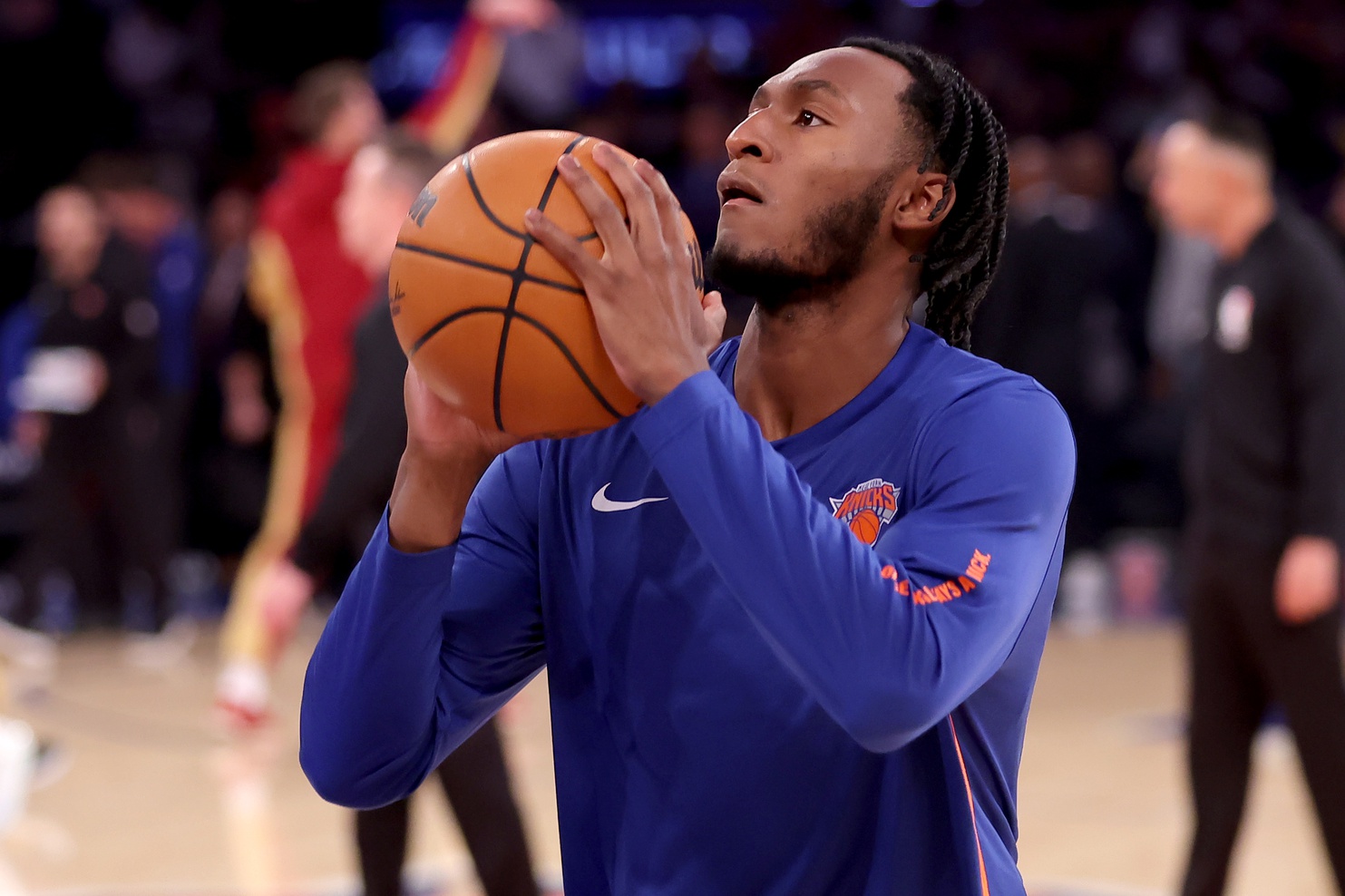New York Knicks guard Immanuel Quickley (5) warms up before a game against the Cleveland Cavaliers at Madison Square Garden.