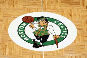 The Boston Celtics logo is seen on the parquet floor at center court before the game between the Boston Celtics and the Washington Wizards at TD Garden.