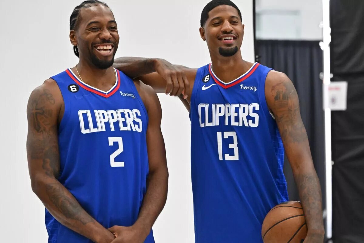 Sep 26, 2022; Playa Vista, CA, USA; Los Angeles Clippers forward Kawhi Leonard (2) and Los Angeles Clippers guard Paul George (13) are photographed on media day at team headquarters in Playa Vista, CA. Mandatory Credit: Jayne Kamin-Oncea-USA TODAY Sports