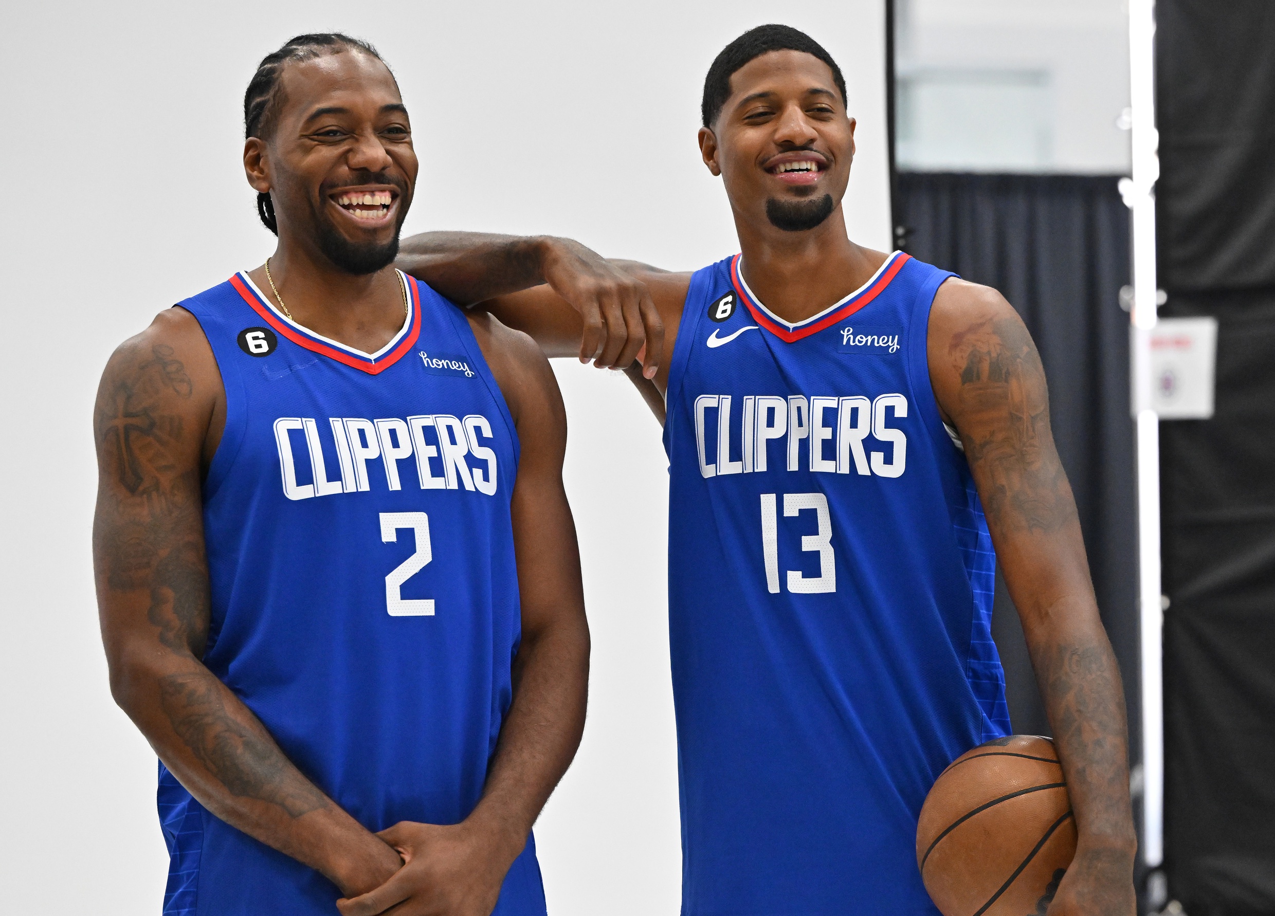 Sep 26, 2022; Playa Vista, CA, USA; Los Angeles Clippers forward Kawhi Leonard (2) and Los Angeles Clippers guard Paul George (13) are photographed on media day at team headquarters in Playa Vista, CA. Mandatory Credit: Jayne Kamin-Oncea-USA TODAY Sports