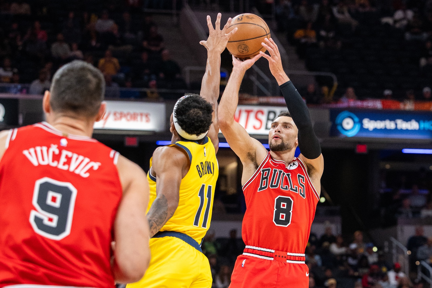 Oct 30, 2023; Indianapolis, Indiana, USA; Chicago Bulls guard Zach LaVine (8) shoots the ball while Indiana Pacers forward Bruce Brown (11) defends in the first quarter at Gainbridge Fieldhouse. Mandatory Credit: Trevor Ruszkowski-USA TODAY Sports