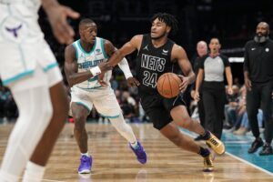 Brooklyn Nets guard Cam Thomas (24) drives to the basket against Charlotte Hornets guard Terry Rozier (3) during the second half at Spectrum Center.