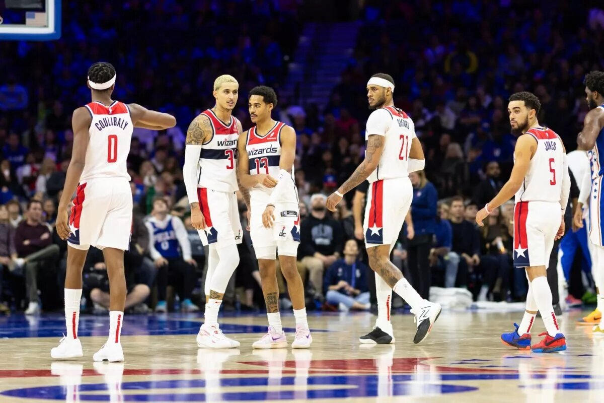 Washington Wizards Kyle Kuzma (33) and Bilal Coulibaly (0) and Jordan Poole (13) and Daniel Gafford (21) and Tyus Jones (5) during the third quarter against the Philadelphia 76ers at Wells Fargo Center.