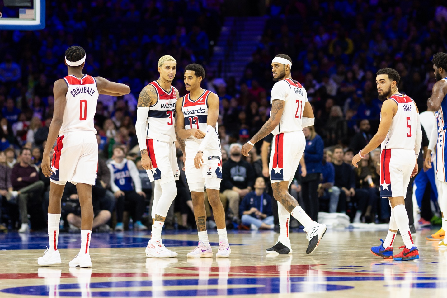 Washington Wizards Kyle Kuzma (33) and Bilal Coulibaly (0) and Jordan Poole (13) and Daniel Gafford (21) and Tyus Jones (5) during the third quarter against the Philadelphia 76ers at Wells Fargo Center.
