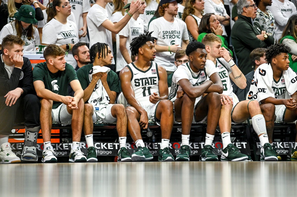 Michigan State's bench looks on against James Madison during overtime on Monday, Nov. 6, 2023, in East Lansing.