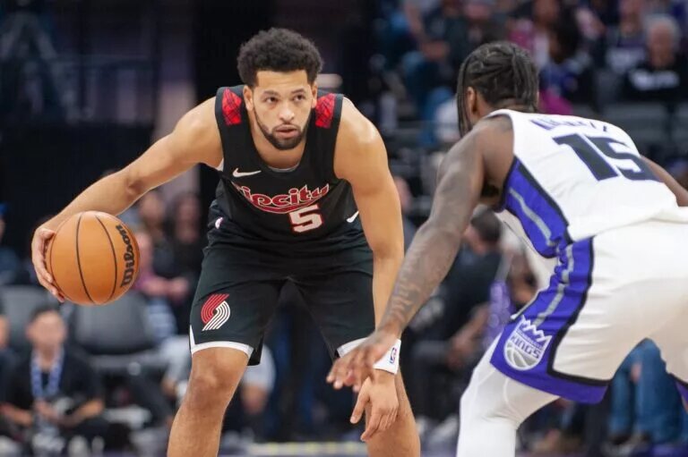 Portland Trail Blazers guard Skylar Mays (5) controls the ball against Sacramento Kings guard Davion Mitchell (15) during the second quarter at Golden 1 Center.