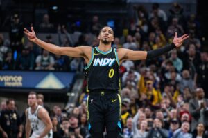 Indiana Pacers guard Tyrese Haliburton (0) celebrates a made shot in the first half against the Milwaukee Bucks at Gainbridge Fieldhouse.