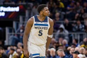 Minnesota Timberwolves guard Anthony Edwards (5) reacts after hitting a three-point shot against the Golden State Warriors during the second half at Chase Center.