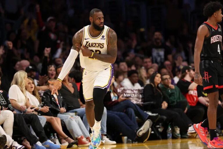 Los Angeles Lakers forward LeBron James (23) reacts after making a three point basket during the fourth quarter against the Houston Rockets at Crypto.com Arena.